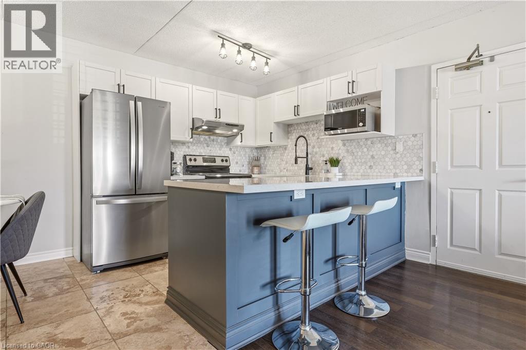 1451 Walkers Line Unit# 304, Burlington, Ontario  L7M 4P1 - Photo 3 - 40825791