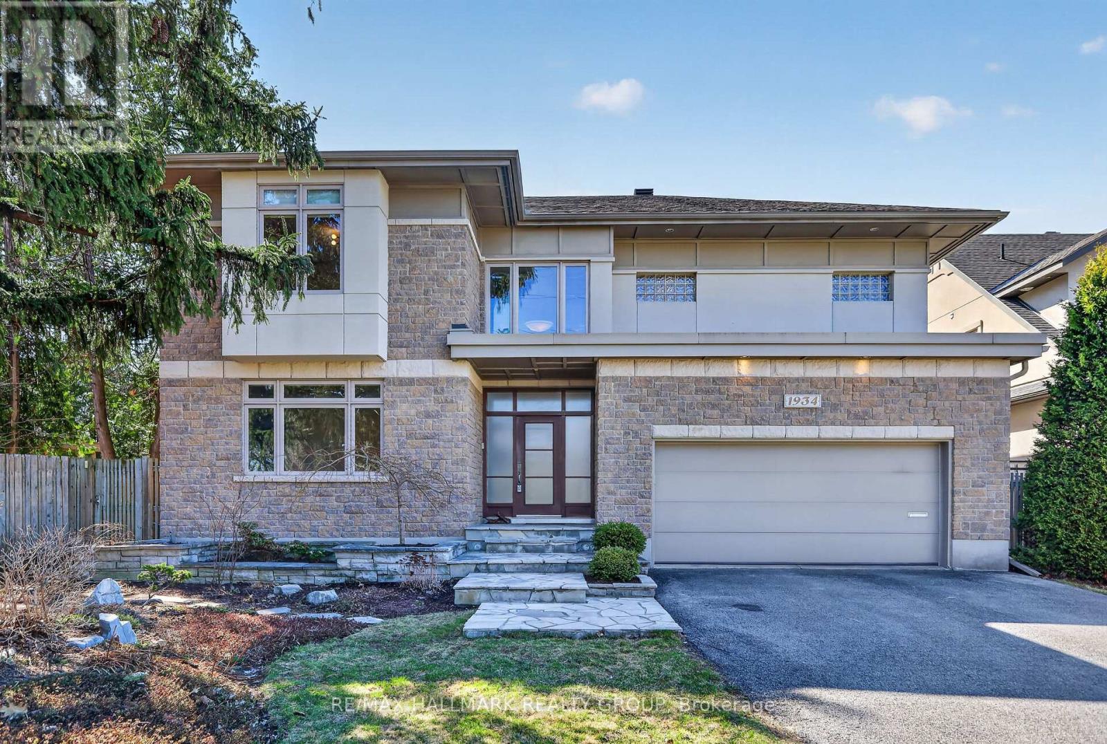 Welcome to GLABAR PARK, one of Ottawa's most sought after neighbourhoods, known for its mature tree lined streets, strong sense of community, and central location close to everything the city has to offer. Set on a generous OVERSIZED lot, this beautifully designed home offers over 4,500 square feet of thoughtfully planned living space that blends comfort, functionality, and timeless style. Designed for both entertaining and everyday living, the home features expansive principal rooms and a seamless layout that allows gatherings to flow effortlessly from one space to the next. Recent updates include a NEWLY TILED front entrance, brand new KITCHEN BACKSPLASH, upgraded light fixtures, and a NEW LAUNDRY STONE COUNTER. At the heart of the home is the stunning kitchen with rich cherry wood cabinetry and high end appliances, creating the perfect space for daily living and hosting alike. With 4 TRULY SPACIOUS BEDROOMS and generous living areas, this home easily accommodates growing families, multi generational living, or anyone who values space and flexibility. Upstairs, the primary suite offers a peaceful retreat complete with a walk in shower and relaxing soaker tub. The FULLY FINISHED, well insulated lower level adds even more versatility with a home gym, additional living space, and potential for a secondary dwelling with its ENLARGED WINDOWS. This home is filled with natural light and designed for the way life truly unfolds, this is a rare opportunity in an exceptional location. (id:48254)