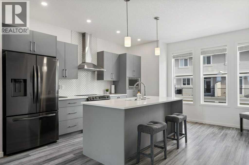 409 South Point Lane SW, Airdrie, Alberta  T4B 5G8 - Photo 4 - A2304977