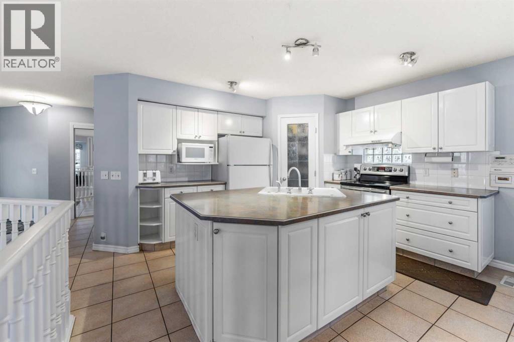 14950 Mt Mckenzie Drive Se, Calgary, Alberta  T2Z 2L4 - Photo 6 - A2305594