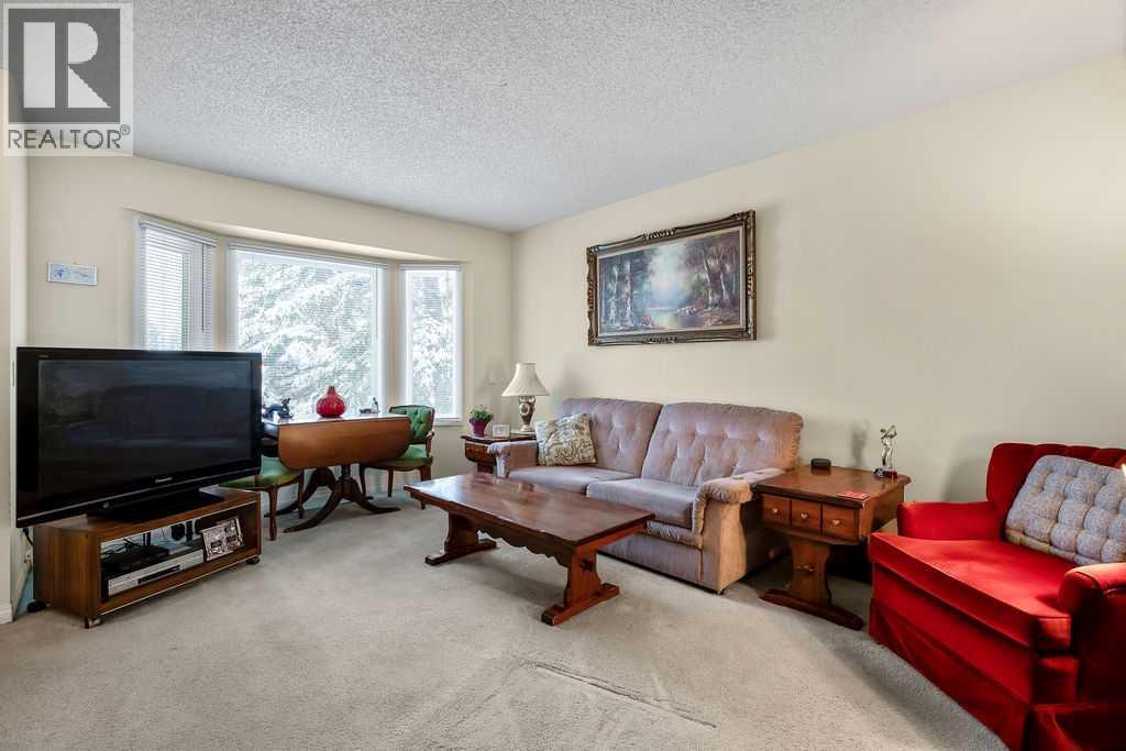 111 Deerfield Drive Se, Calgary, Alberta  T2J 6T9 - Photo 3 - A2292660