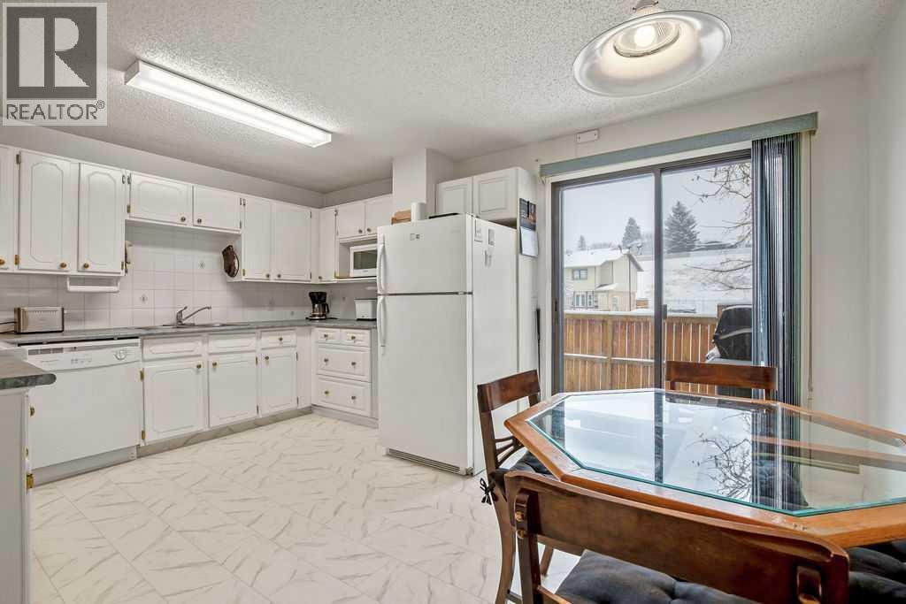 111 Deerfield Drive Se, Calgary, Alberta  T2J 6T9 - Photo 8 - A2292660