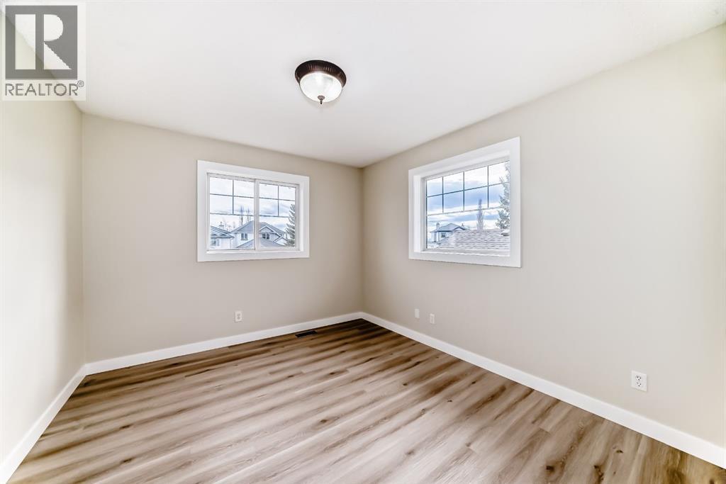 311 Rocky Ridge Cove Nw, Calgary, Alberta  T3G 4K1 - Photo 29 - A2300845
