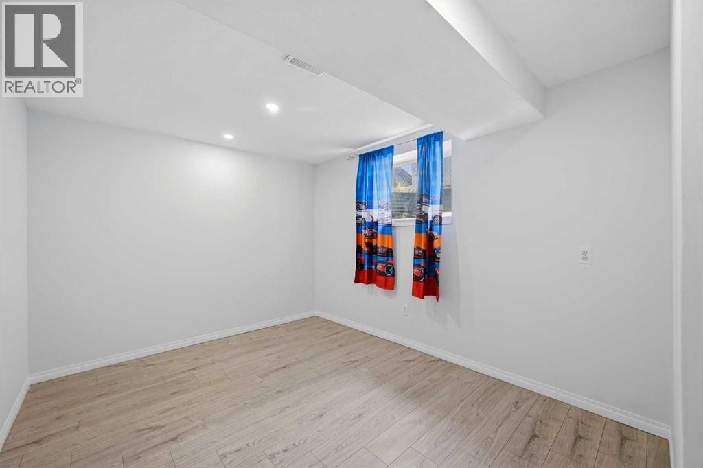 256 Saddlecrest Boulevard Ne, Calgary, Alberta  T3J 5L6 - Photo 45 - A2306148