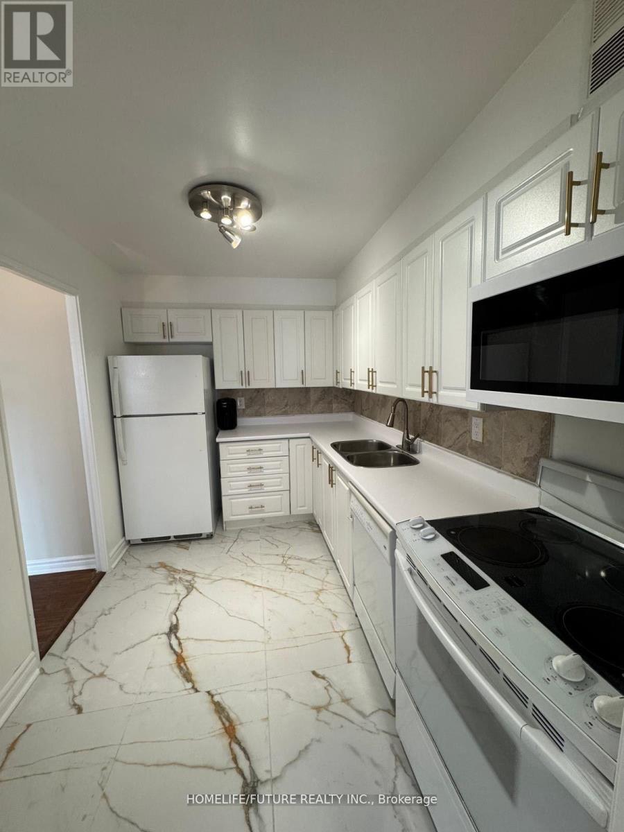 210 - 120 Dundalk Drive, Toronto, Ontario  M1P 4V9 - Photo 4 - E13065108