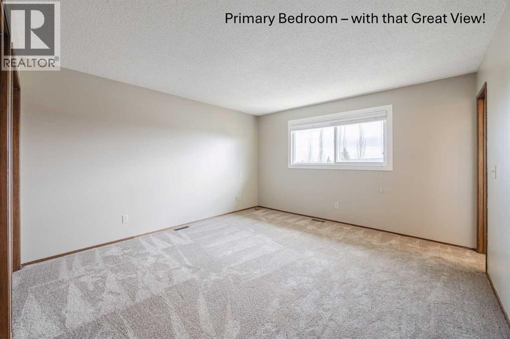 128 Silver Ridge Rise Nw, Calgary, Alberta  T3B 4P7 - Photo 12 - A2305052