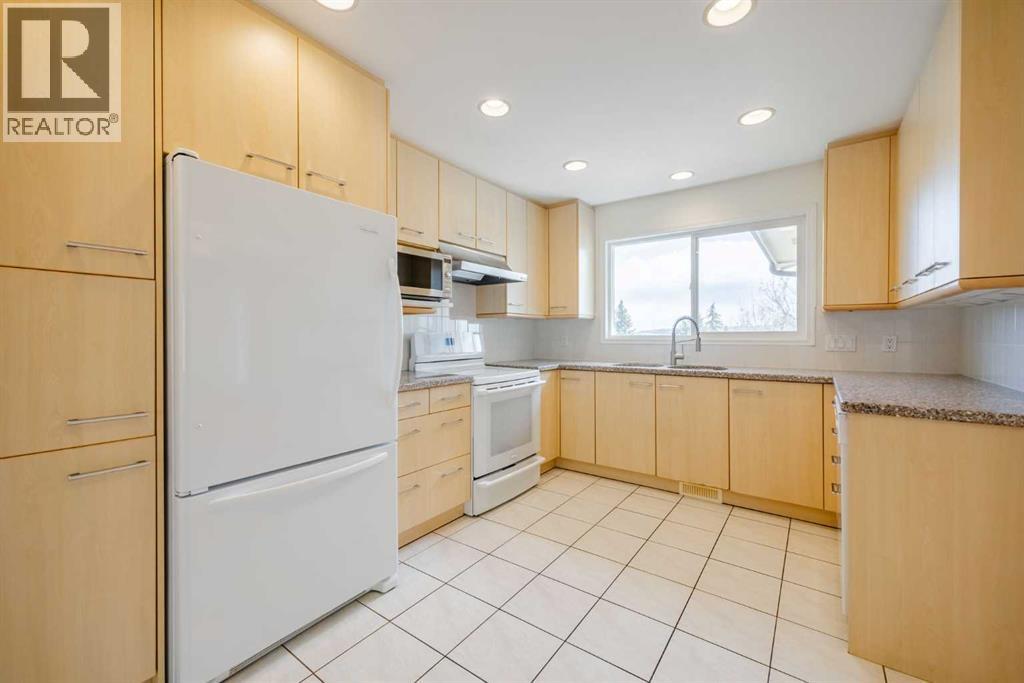 128 Silver Ridge Rise Nw, Calgary, Alberta  T3B 4P7 - Photo 9 - A2305052