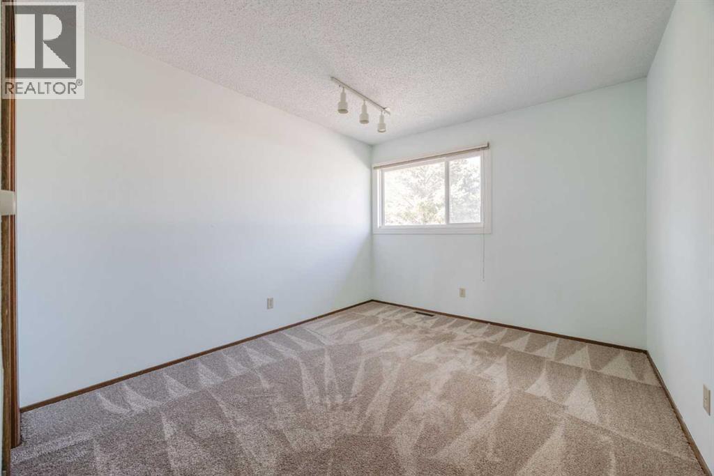 128 Silver Ridge Rise Nw, Calgary, Alberta  T3B 4P7 - Photo 17 - A2305052