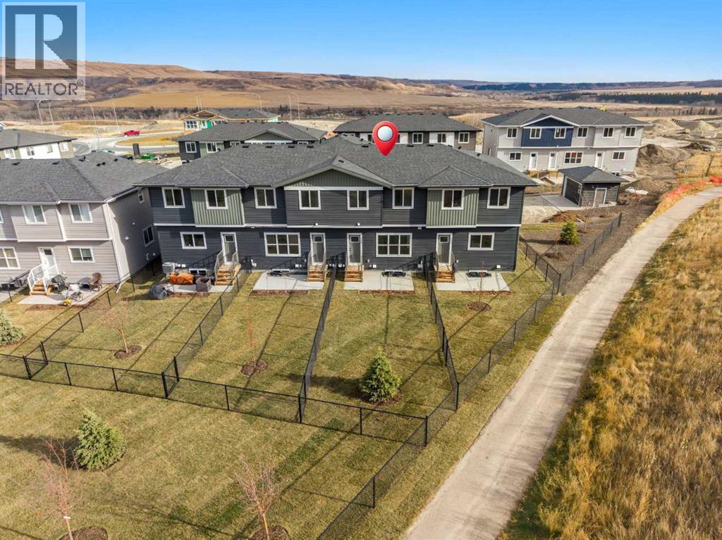 1206, 525 River Heights Drive, Cochrane, Alberta  T4C 3E3 - Photo 2 - A2282391