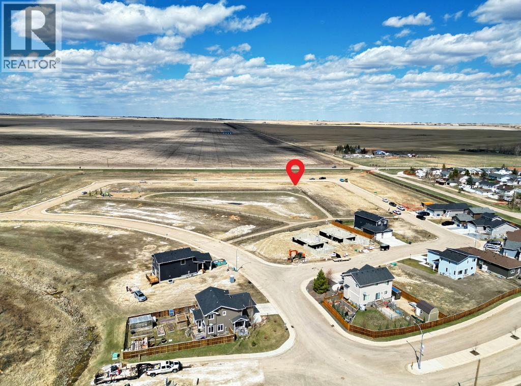 91, 87, 83, 79, 55 Clover Crescent, Beiseker, Alberta  T0M 0G0 - Photo 6 - A2305698