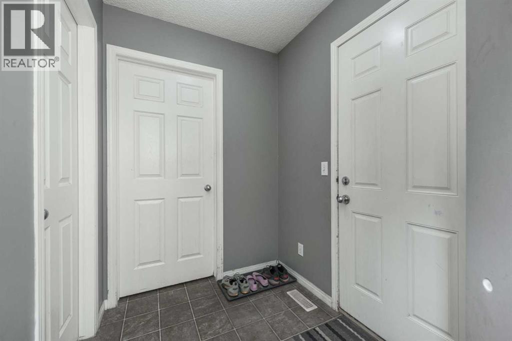 56 Evansbrooke Landing, Calgary, Alberta  T3P 1G5 - Photo 5 - A2301292