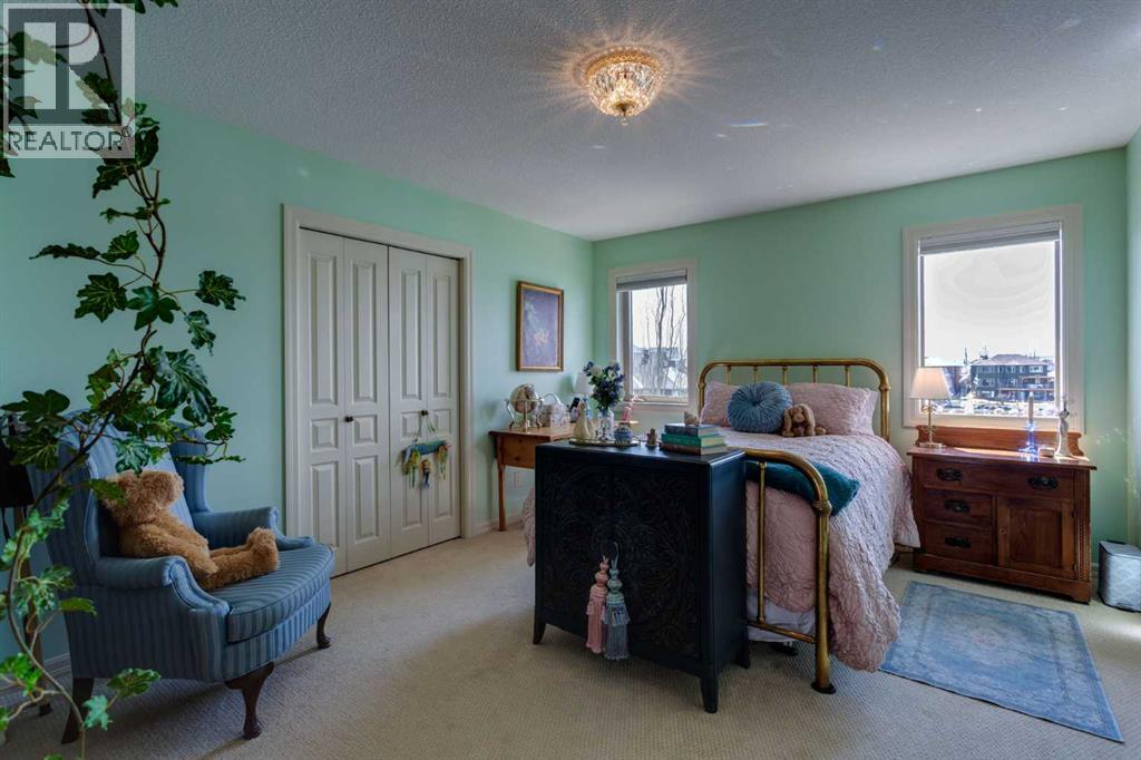 210 Crystal Shores Drive, Okotoks, Alberta  T1S 2C5 - Photo 32 - A2305970