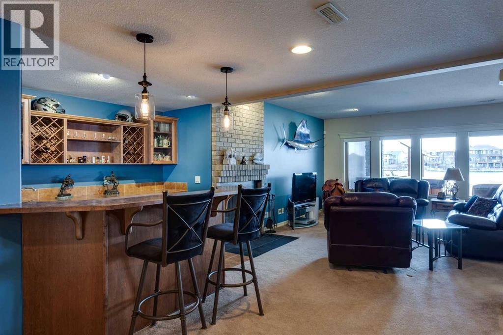 210 Crystal Shores Drive, Okotoks, Alberta  T1S 2C5 - Photo 34 - A2305970