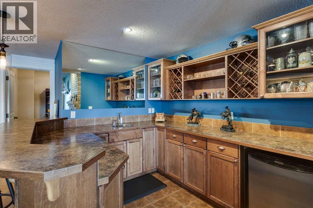 210 Crystal Shores Drive, Okotoks, Alberta  T1S 2C5 - Photo 35 - A2305970