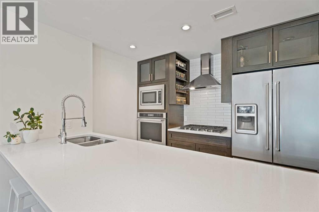 101, 3320 3 Avenue NW, Calgary, Alberta  T2N 0L9 - Photo 5 - A2306738