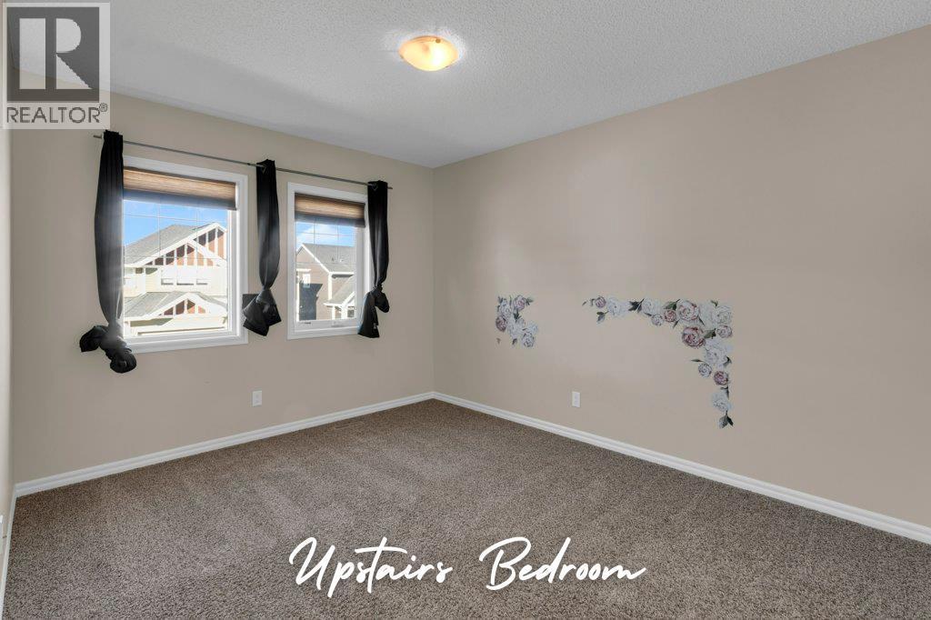 207 River Heights Crescent, Cochrane, Alberta  T4C 0V1 - Photo 15 - A2286899