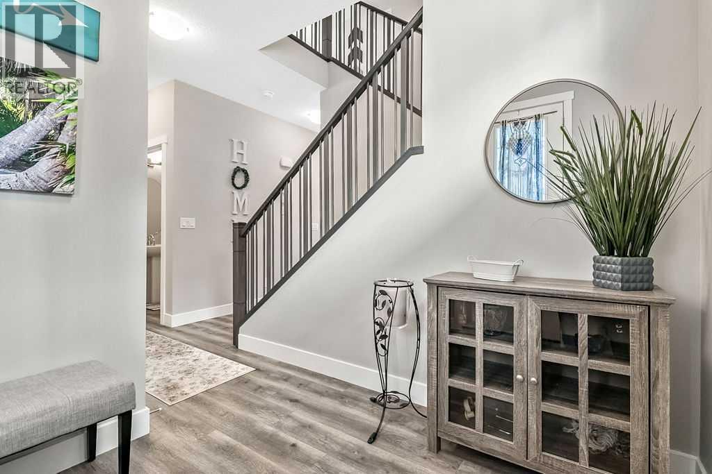 75 Sundown Way, Cochrane, Alberta  T4C 2M4 - Photo 4 - A2306790