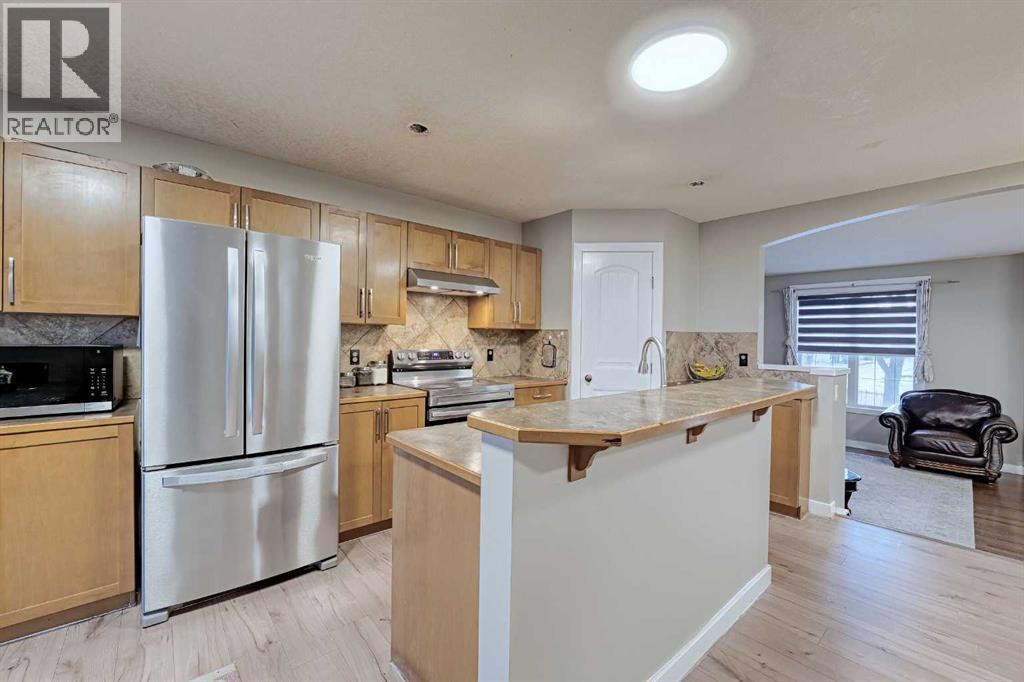 303 Saddlebrook Way Ne, Calgary, Alberta  T3J 0B4 - Photo 4 - A2288192