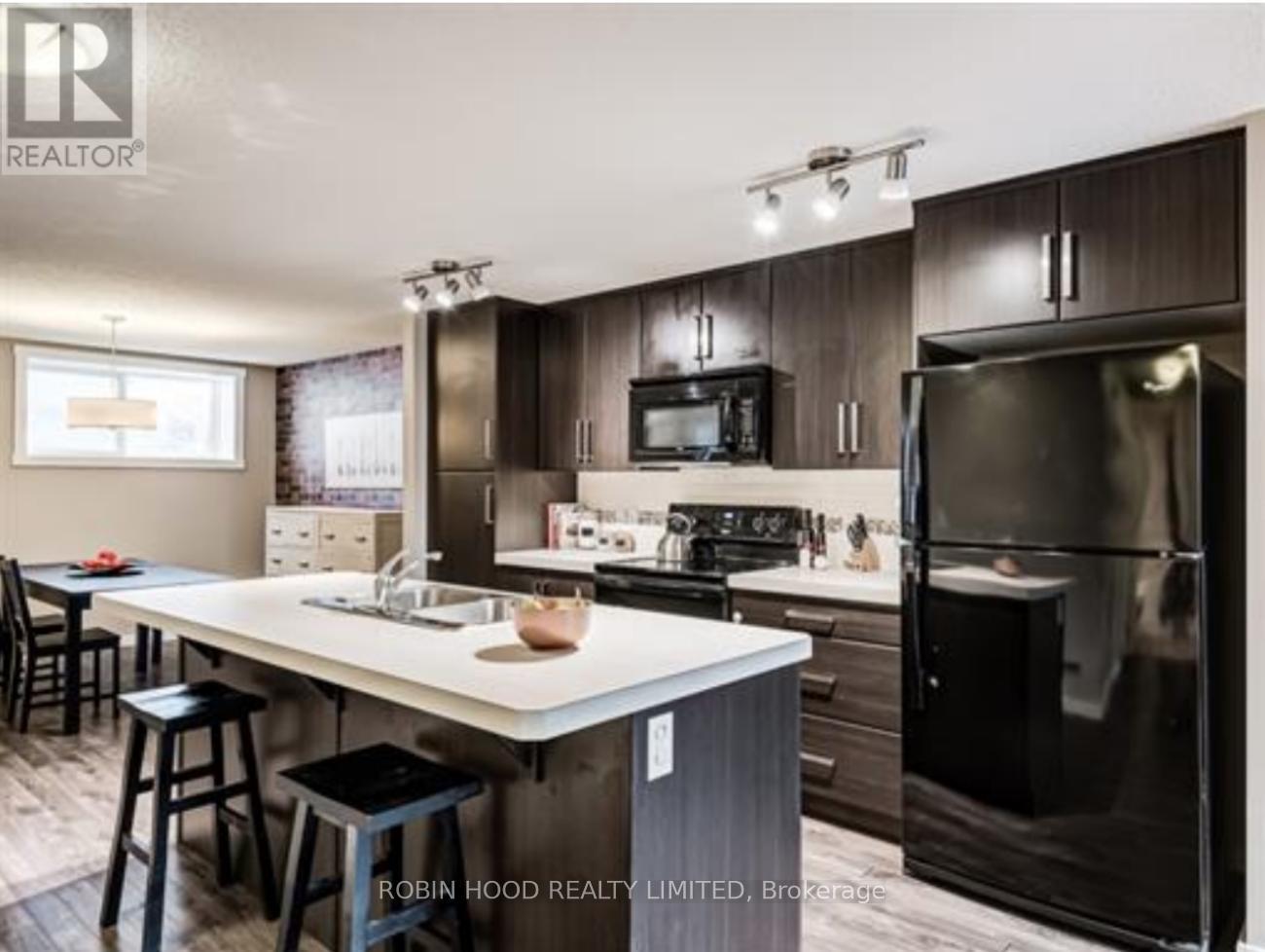 100 - 517 MCKENZIE TOWNE CLOSE S, Calgary, Alberta