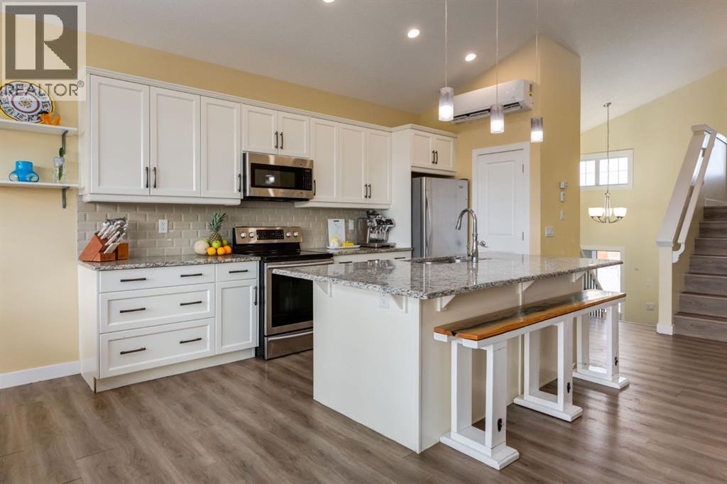 140 Emberside Glen, Cochrane, Alberta  T4C 2L7 - Photo 4 - A2306513