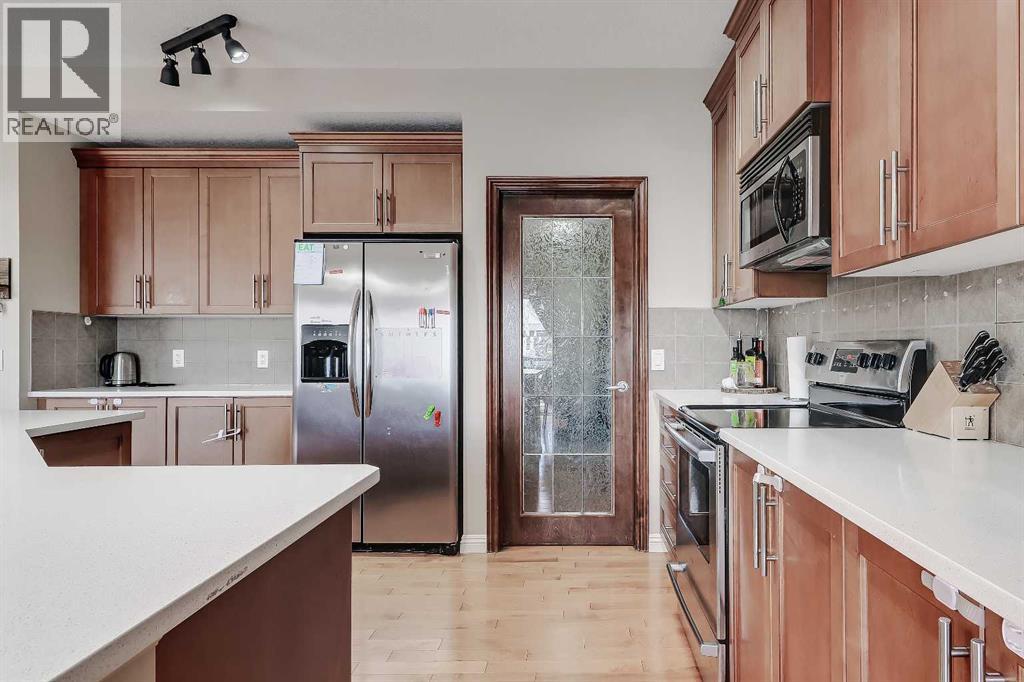 196 Hawkmere Way, Chestermere, Alberta  T1X 0C9 - Photo 4 - A2306632