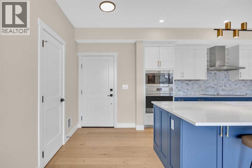 409, 15 Cougar Ridge Landing SW, Calgary, Alberta  T3H 6C3 - Photo 3 - A2302577