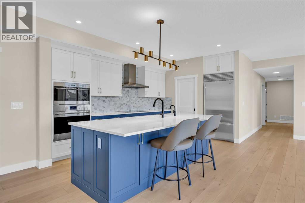 409, 15 Cougar Ridge Landing SW, Calgary, Alberta  T3H 6C3 - Photo 2 - A2302577