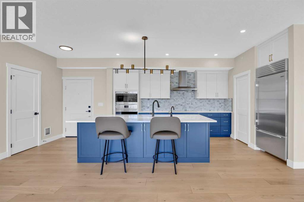 409, 15 Cougar Ridge Landing SW, Calgary, Alberta  T3H 6C3 - Photo 4 - A2302577
