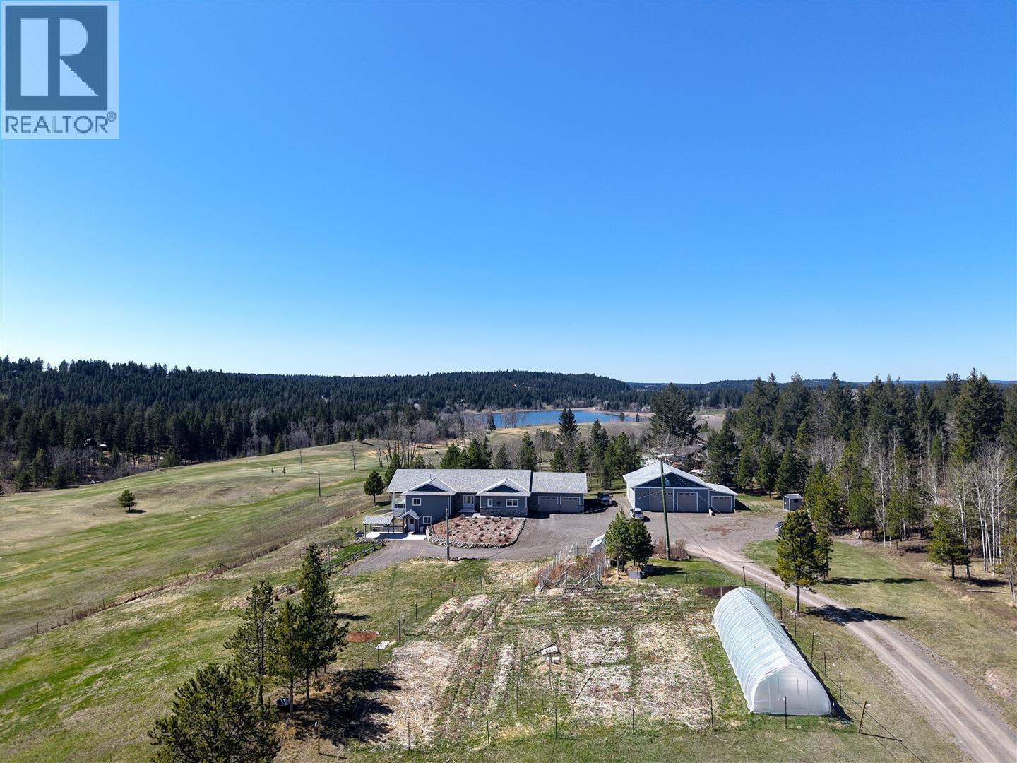 4898 Telqua Drive, 108 Mile Ranch, British Columbia  V0K 2Z0 - Photo 1 - R3118114