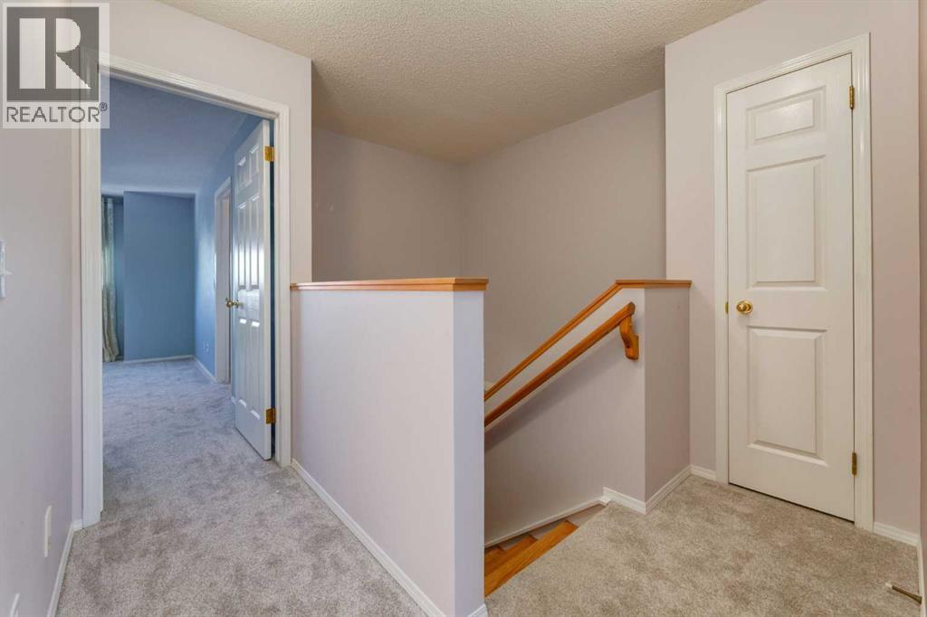 318 Hawkstone Manor Nw, Calgary, Alberta  T3G 3X2 - Photo 11 - A2303403