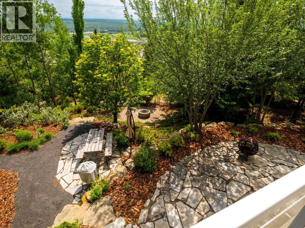 57 Slopes Point SW, Calgary, Alberta  T3H 3Y8 - Photo 5 - A2278913