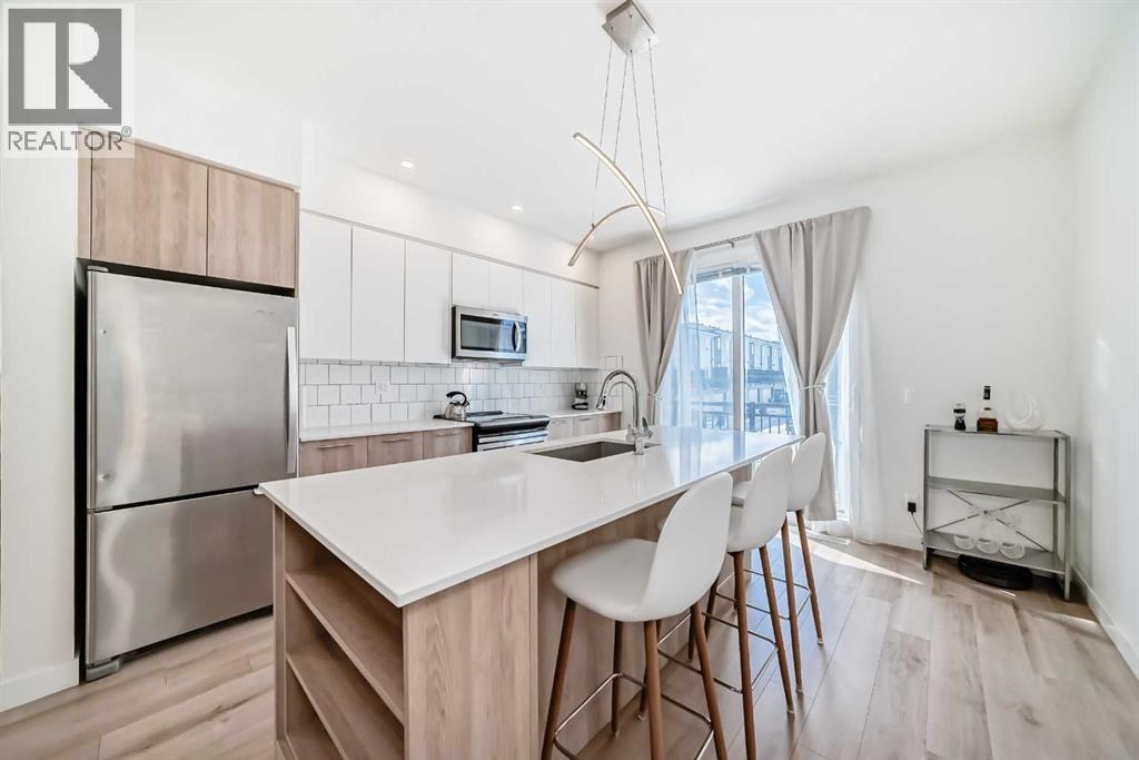 871 Belmont Drive SW, Calgary, Alberta  T2X 4P2 - Photo 8 - A2306048