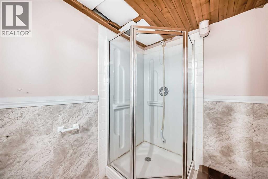921 Mckinnon Drive Ne, Calgary, Alberta  T2E 7B5 - Photo 32 - A2303810
