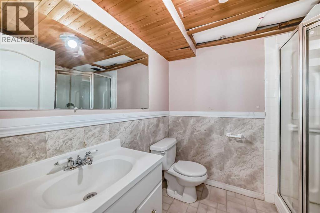 921 Mckinnon Drive Ne, Calgary, Alberta  T2E 7B5 - Photo 31 - A2303810