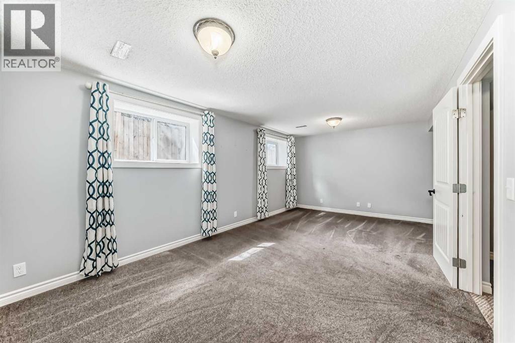921 Mckinnon Drive Ne, Calgary, Alberta  T2E 7B5 - Photo 27 - A2303810