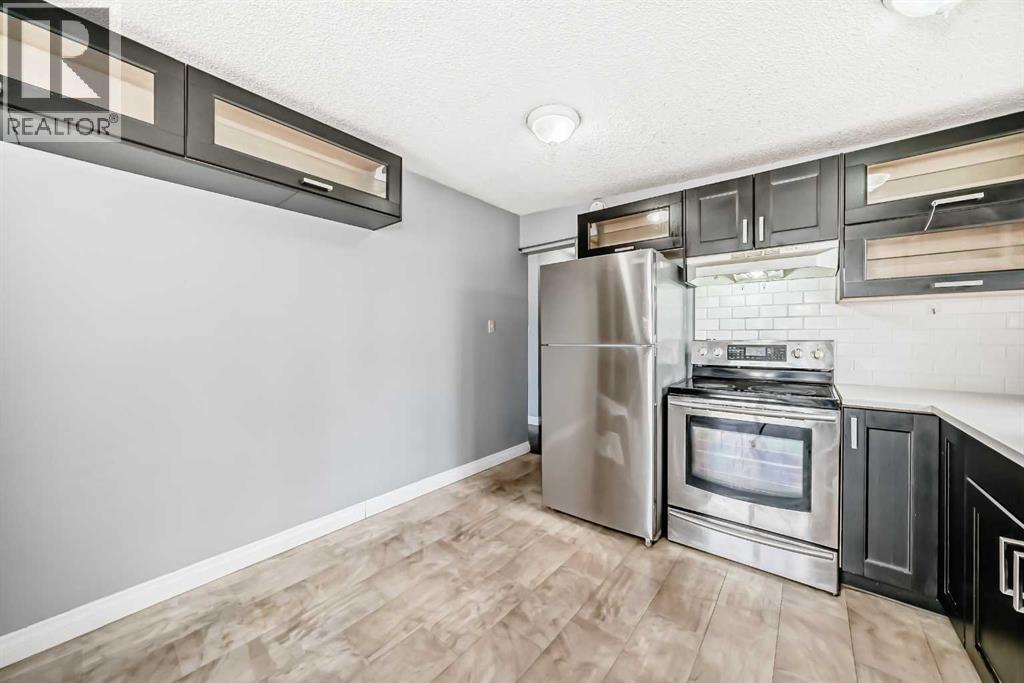 921 Mckinnon Drive Ne, Calgary, Alberta  T2E 7B5 - Photo 6 - A2303810