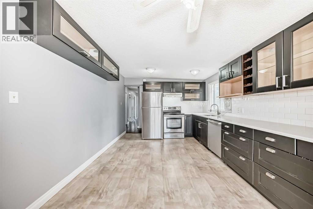 921 Mckinnon Drive Ne, Calgary, Alberta  T2E 7B5 - Photo 5 - A2303810