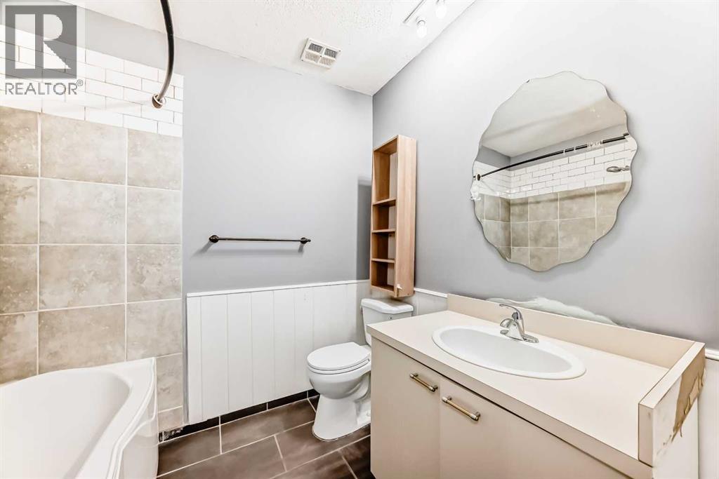 921 Mckinnon Drive Ne, Calgary, Alberta  T2E 7B5 - Photo 19 - A2303810
