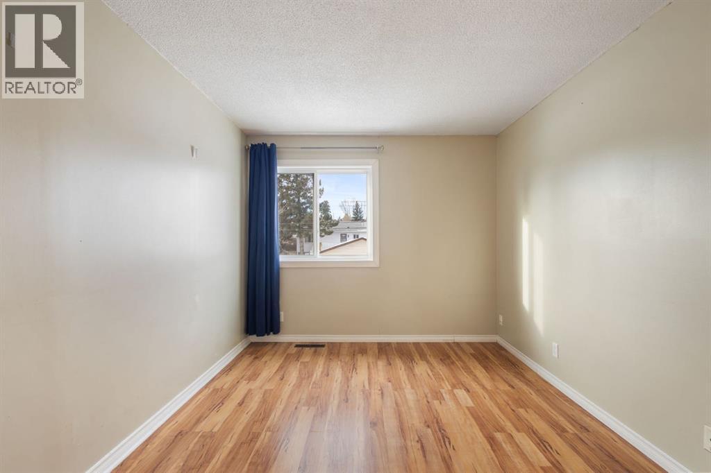 6, 6147 Buckthorn Road NW, Calgary, Alberta  T2K 2Z2 - Photo 15 - A2278314