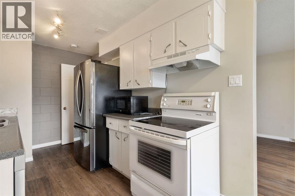 6, 6147 Buckthorn Road NW, Calgary, Alberta  T2K 2Z2 - Photo 10 - A2278314