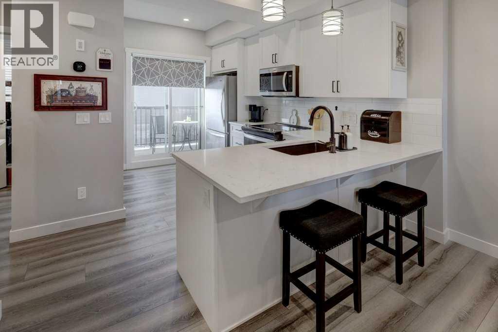 703, 115 Sagewood Drive Sw, Airdrie, Alberta  T4B 4V6 - Photo 3 - A2281530