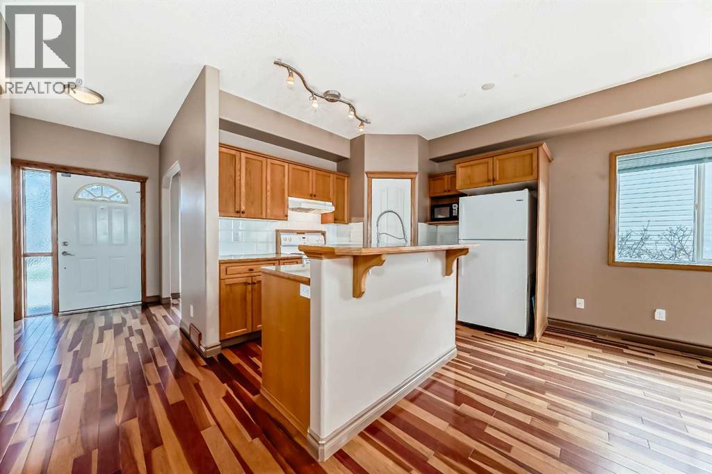 89 Hidden Ranch Hill Nw, Calgary, Alberta  T3A 5X7 - Photo 8 - A2305848