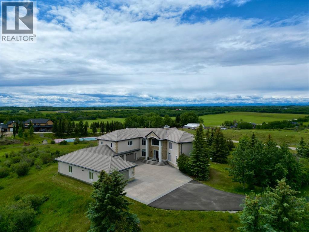 262060 Range Road 33, Rural Rocky View County, Alberta  T4C 0G6 - Photo 1 - A2302494