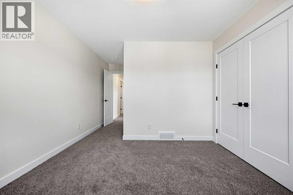 121 Quartz Crescent, Cochrane, Alberta  T4C 3G2 - Photo 32 - A2299921