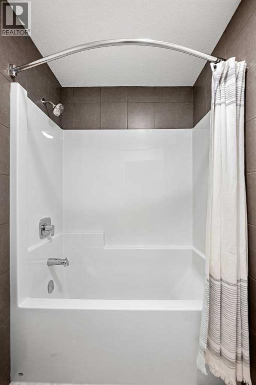 121 Quartz Crescent, Cochrane, Alberta  T4C 3G2 - Photo 36 - A2299921