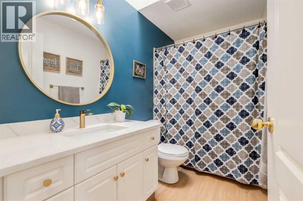 402 Rocky Ridge Cove Nw, Calgary, Alberta  T3G 4J6 - Photo 21 - A2306917