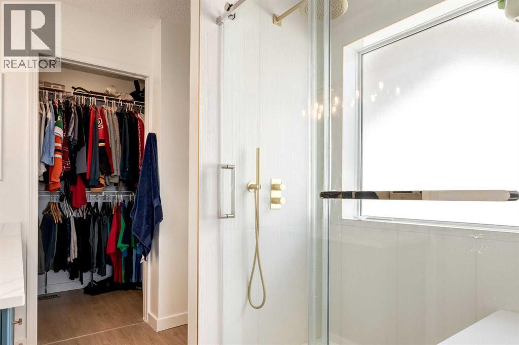402 Rocky Ridge Cove Nw, Calgary, Alberta  T3G 4J6 - Photo 18 - A2306917