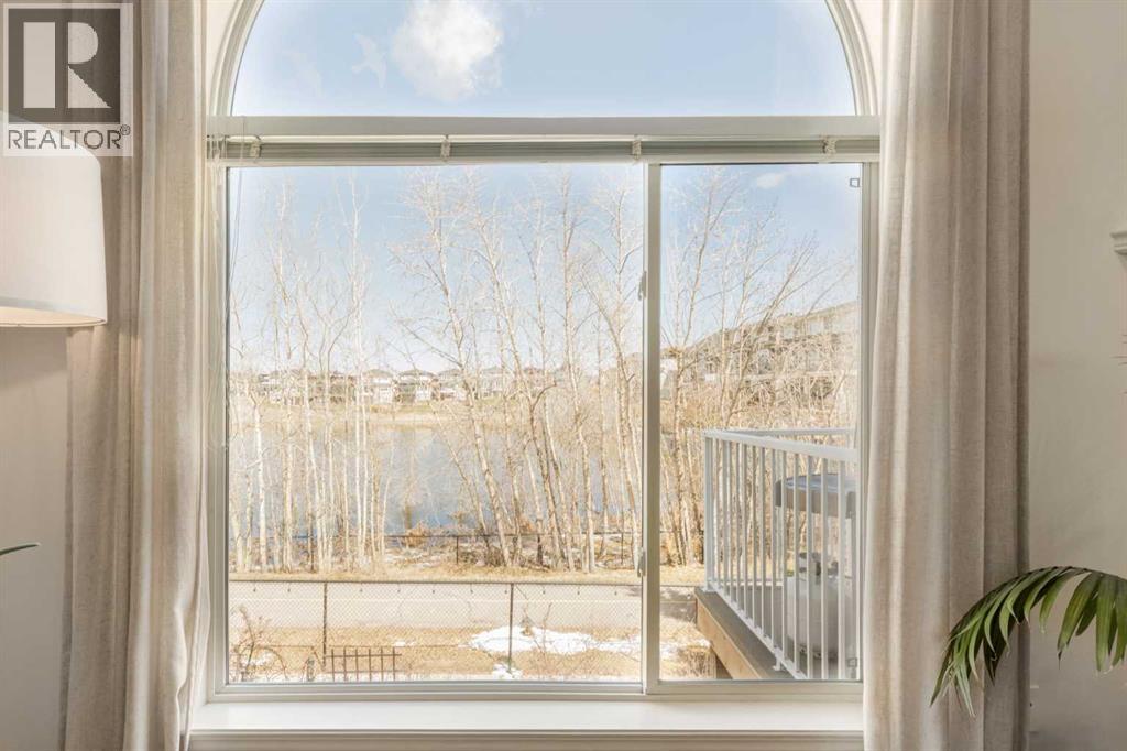 402 Rocky Ridge Cove Nw, Calgary, Alberta  T3G 4J6 - Photo 12 - A2306917