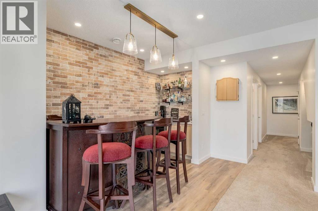 402 Rocky Ridge Cove Nw, Calgary, Alberta  T3G 4J6 - Photo 28 - A2306917