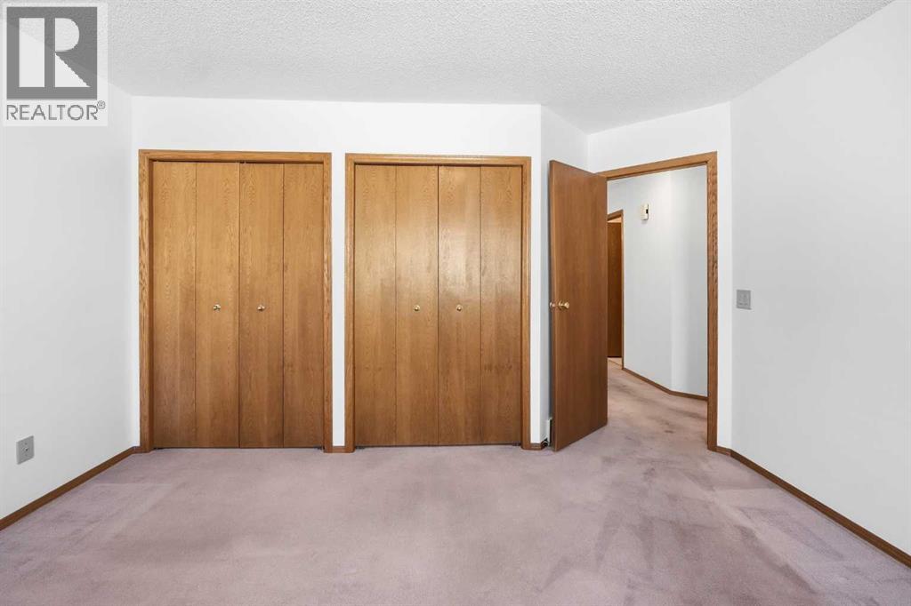12 Arbour Cliff Close NW, Calgary, Alberta  T3G 3W8 - Photo 17 - A2276284